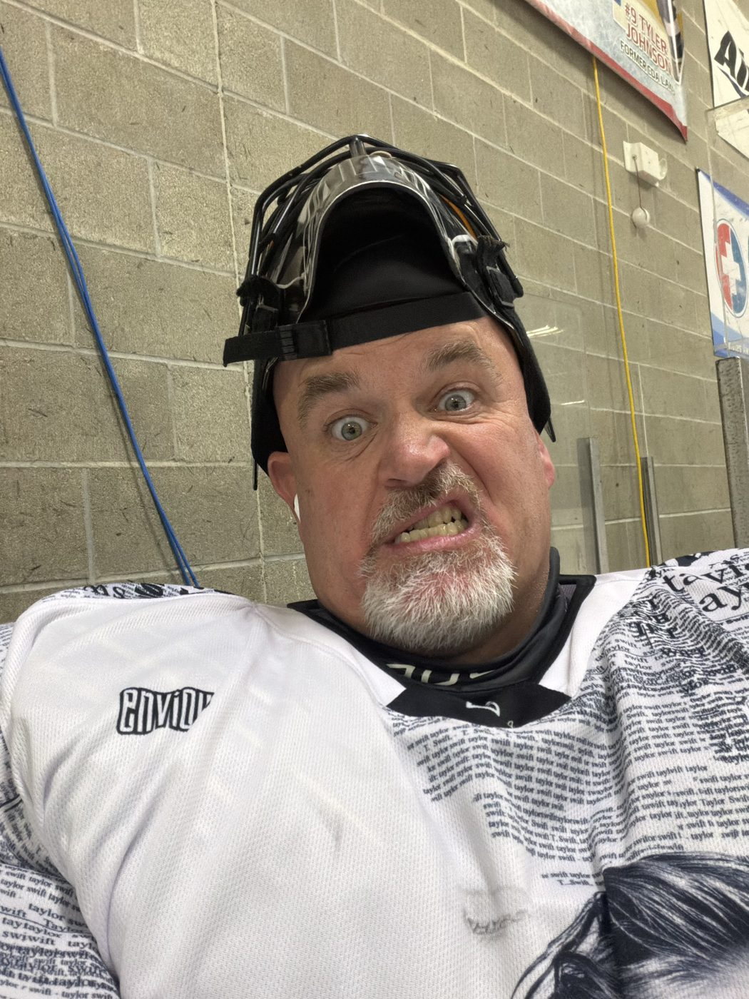 Mike Baker game-face selfie in his goalie mask at the rink