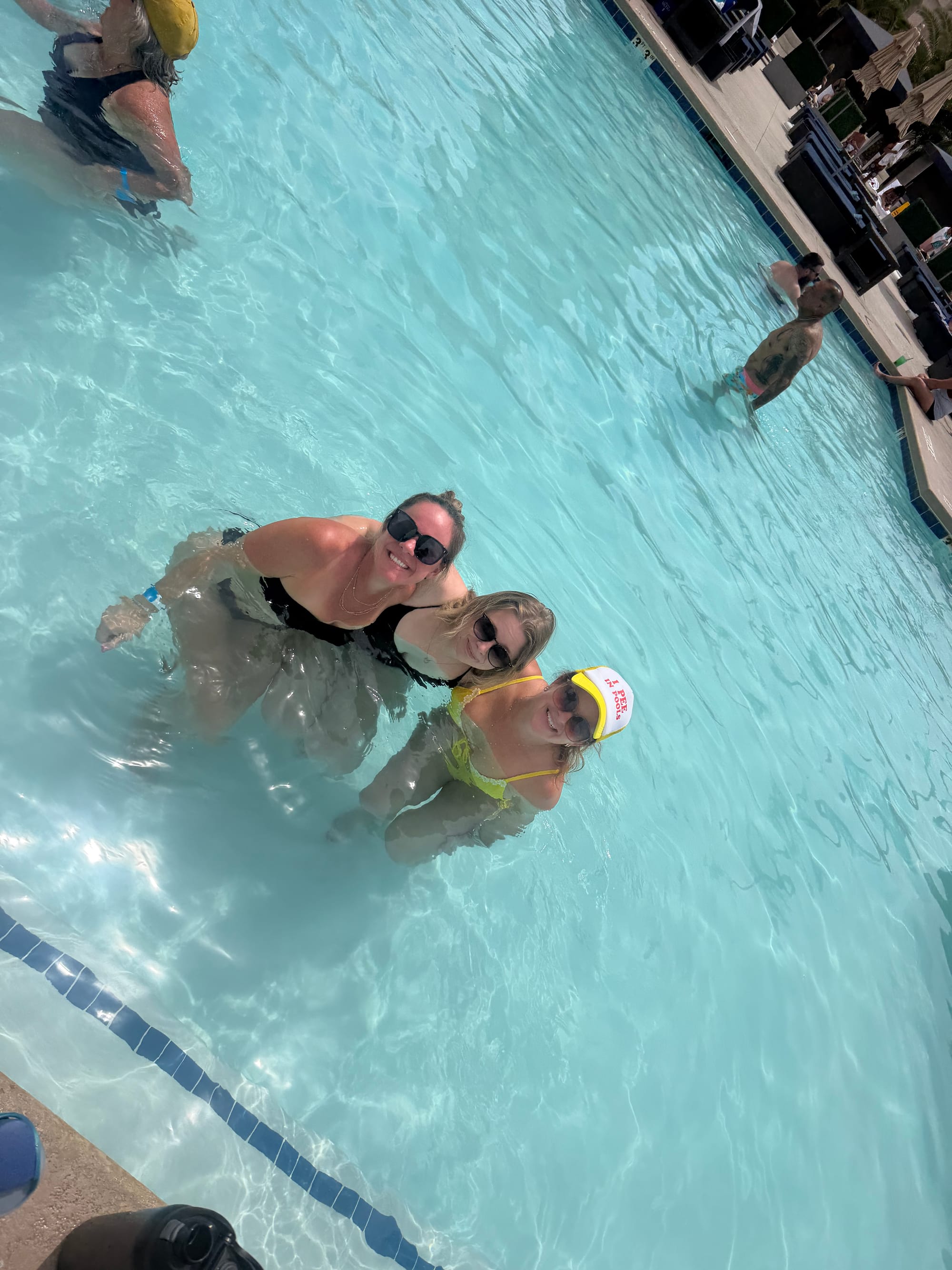 The pool crew, birthday girl in her hat