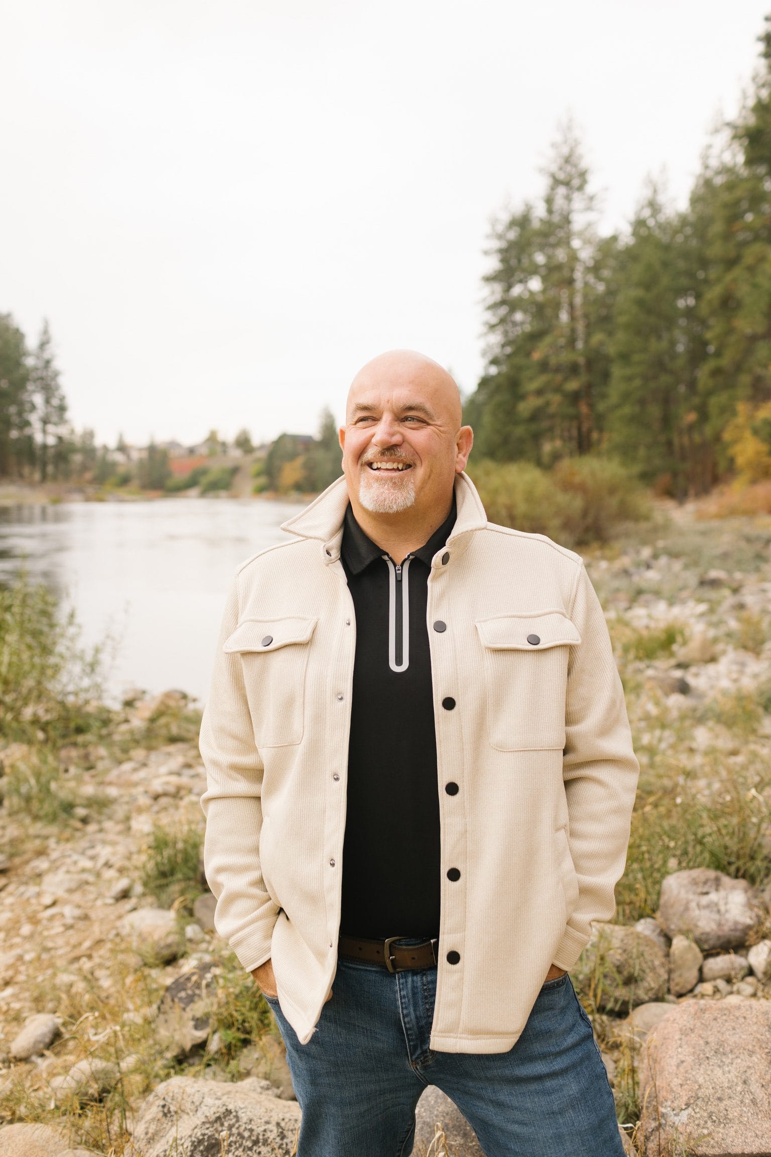 Mike Baker standing by a river